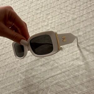 Chic White Sunglasses with Gold Accent Chanel